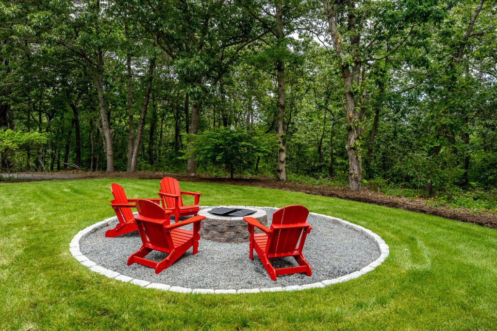 Around back, you can lounge around the new fire pit in the renovated backyard, enjoying a peaceful view of the surrounding wetlands.