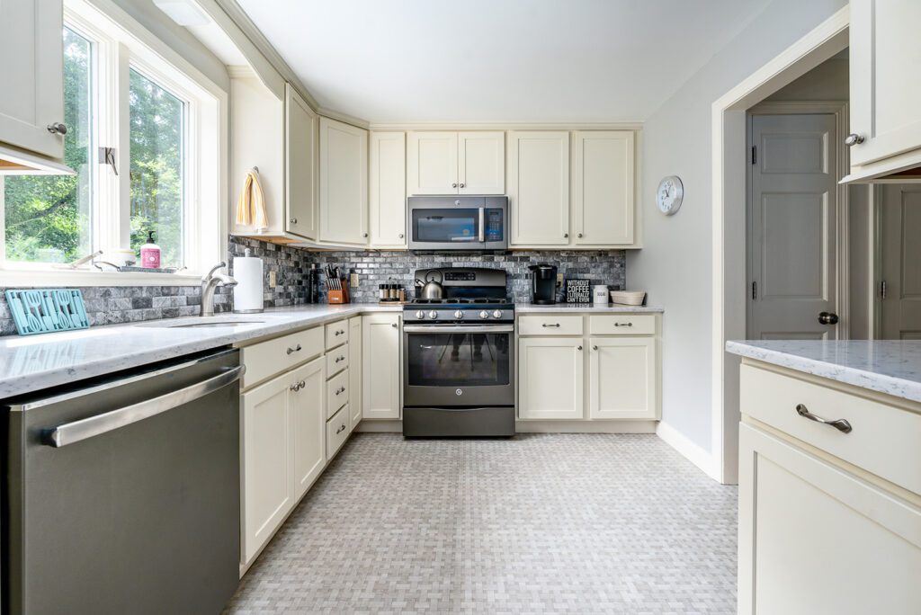 The kitchen features modern appliances, accessories, and ample counter space